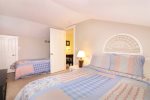 Upstairs bedroom with a queen and a twin